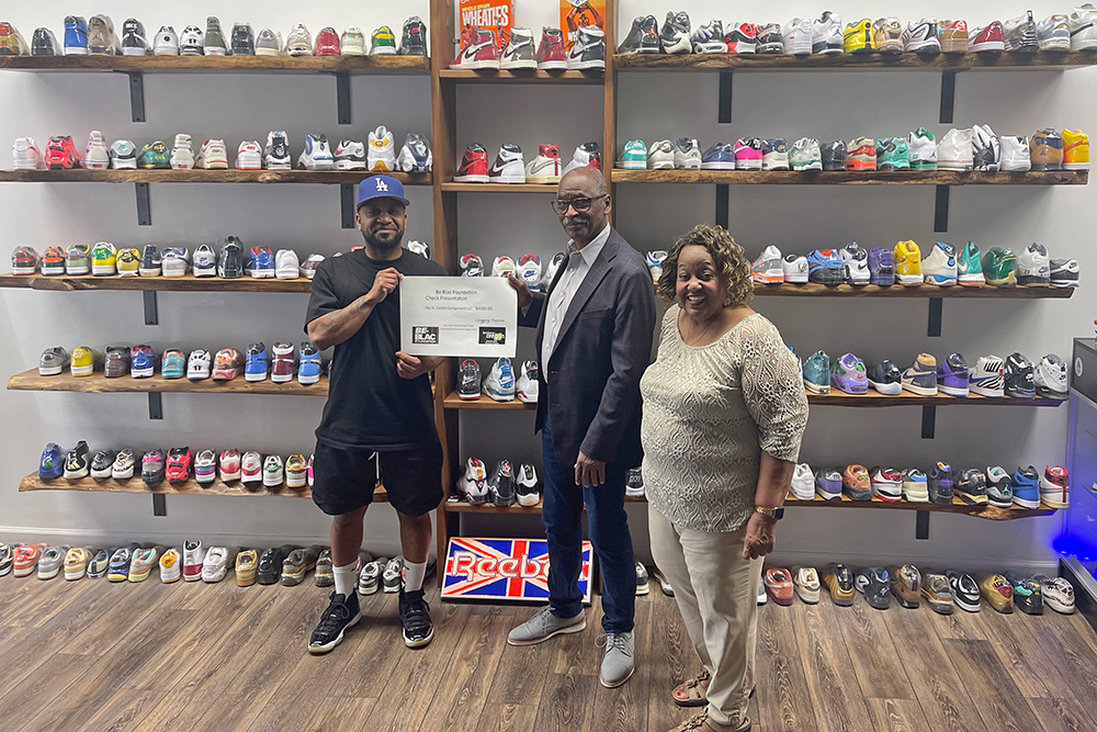 Be BLAC Foundation presenting funding to Capitol Consignment