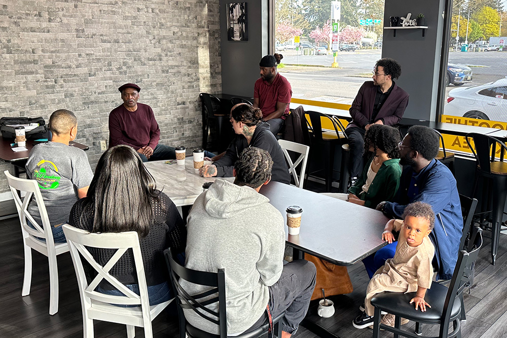 Coffee-7-coffee-meet-greggery-landscape-1000w-01 a group at a Be BLAC Foundation coffee meetup