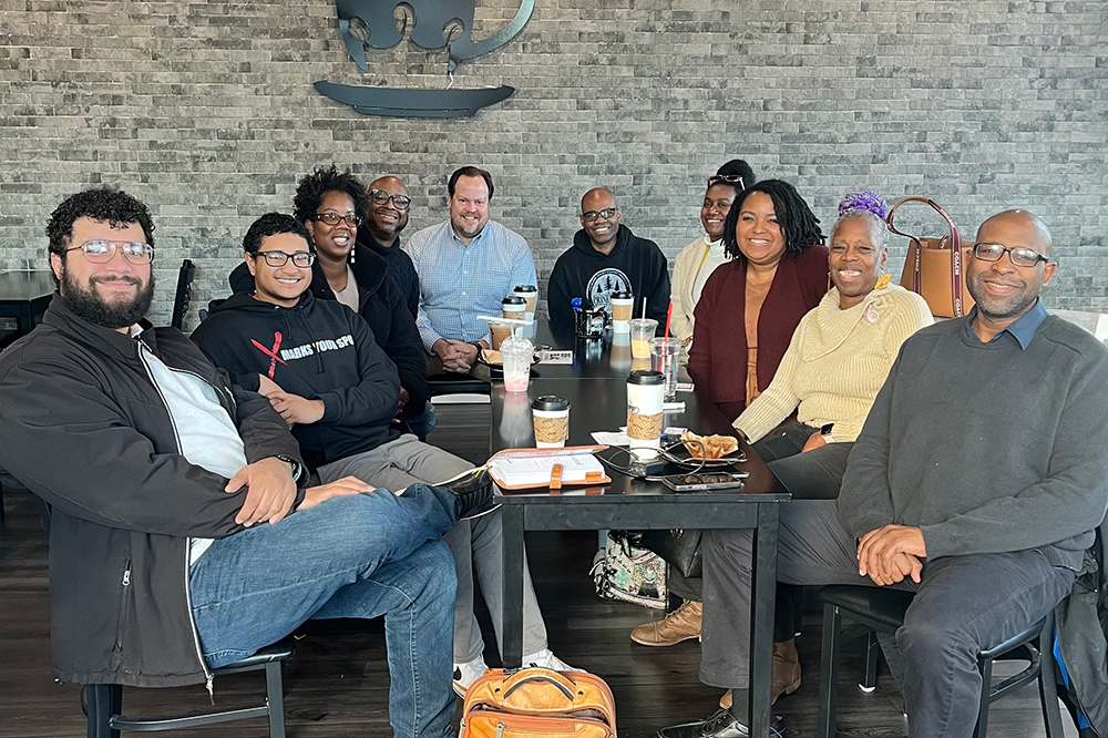 a group at a Be BLAC Foundation coffee meetup