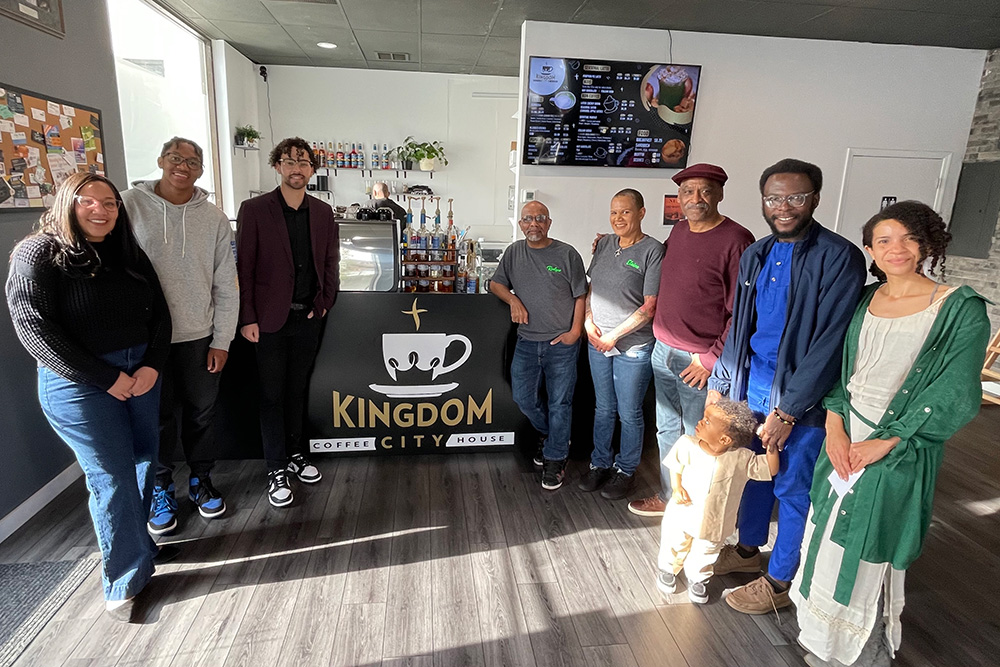 a group at a Be BLAC Foundation coffee meetup at Kingdom City Coffeehouse